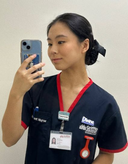 Nursing student taking selfie.