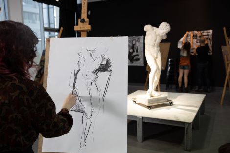 A student works on a drawing in the QCA drawing studio