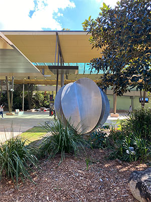 a steel sculpture on the lawn