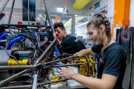 Woman engineer working on Griffith Racing Team car