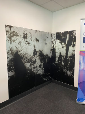 black and white abstract photograph that spans two walls that joined at right angles