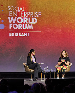 women presenting at conference