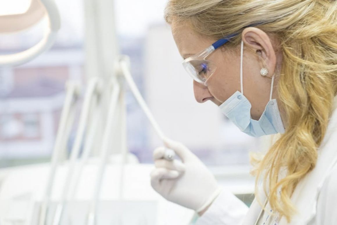 A doctor examining a patient