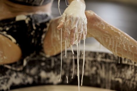 Libby McDonnell, Show Girl, 2020. Live performance with corn-starch flour and water. Performed by Bridie Hooper at the Brisbane Powerhouse. Photographic documentation by Billie Wilson-Coffey 3