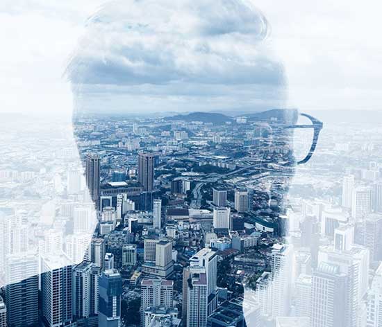 Concept image of a human super-imposed over a city