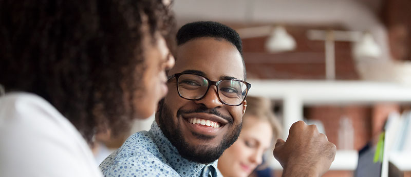a man enjoys interacting with his friend