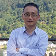 Professor YongSheng Gao posing on a hill
