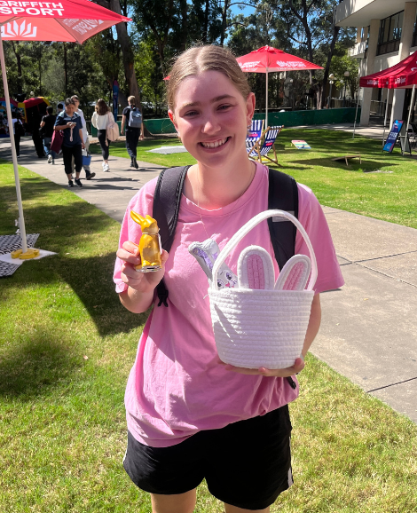 Student holding easter prize