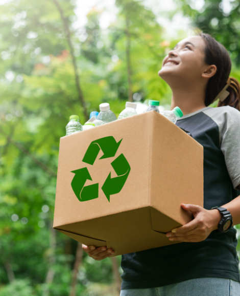 woman holding recycling box