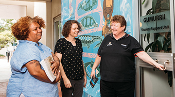 Student advisor opening the door to the GUMURRII support service