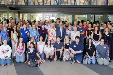 Staff giving group photo