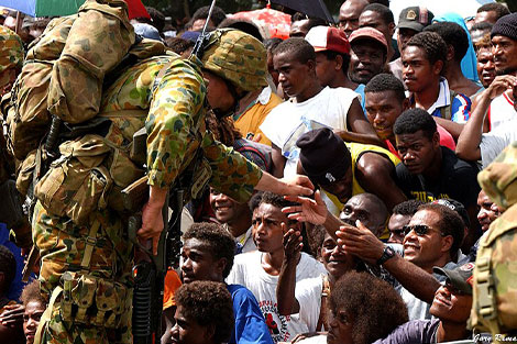 Australian military with crowd of Pacific local people