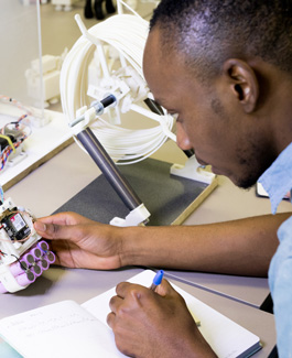 Student working on electronics