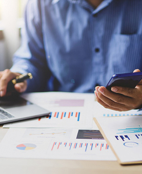 a man calculating figures