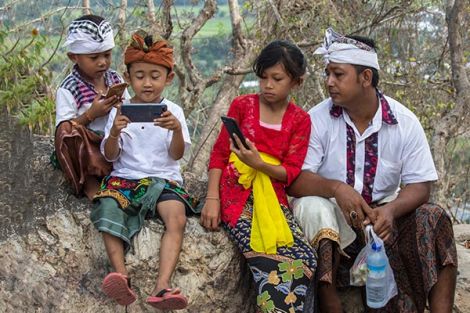 Bangladesh family with mobile devices