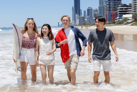 Thumbnail of the Digital Study Abroad and Exchange Guide showing a photo of a female student standing in front of the beach
