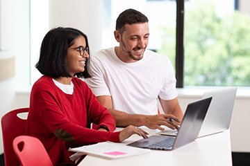 Students studying with their laptops