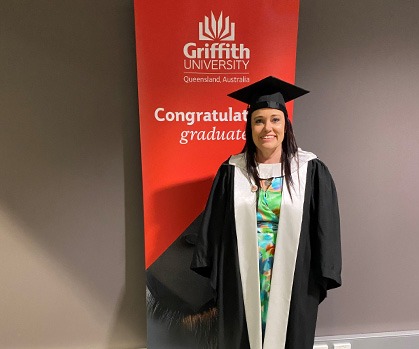 Pictured: MBA Alumnus, Julie Rainbow receiving her degree certificate from Chancellor, The Honourable Andrew Fraser at the Griffith University graduation ceremony. 