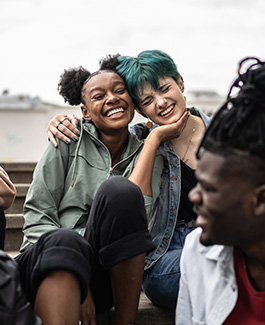 Group of friends talking in the street