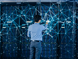 Man standing in front of a virtual wall