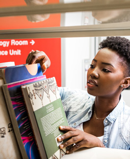 Student with library books
