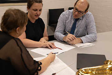 Teacher with two students
