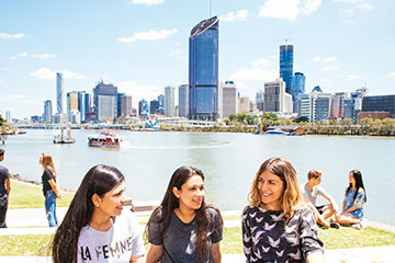 Students by the Brisbane River
