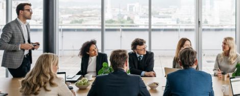 A group of professionals sitting around a table